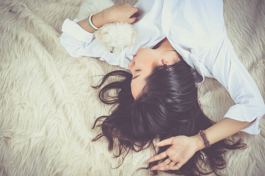 Girl lying down on floor