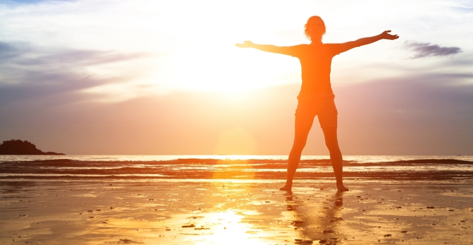 Woman exercising outdoors on the beach