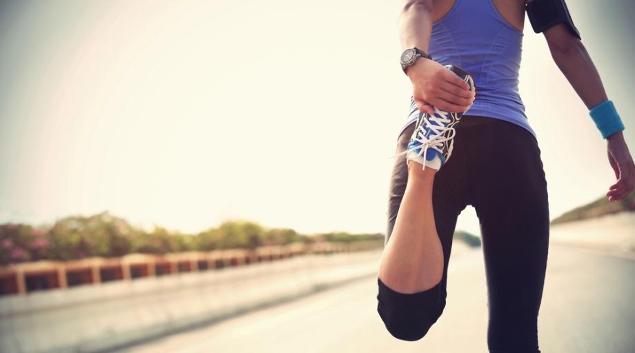 Woman stretching before jogging