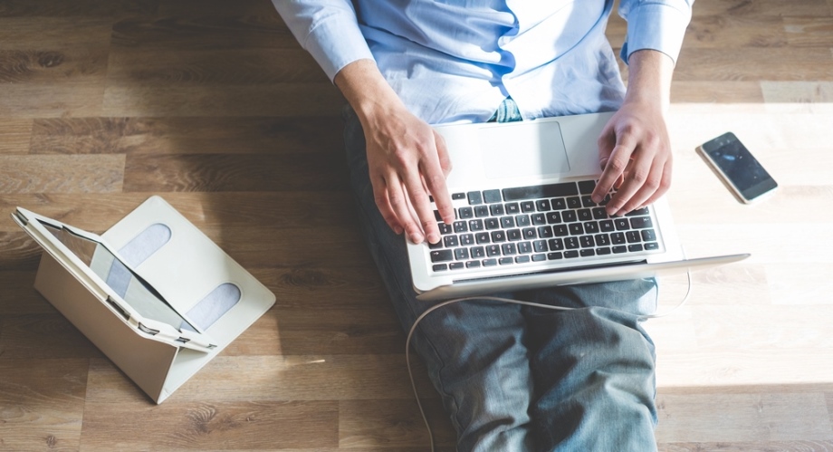 Man working at his online business