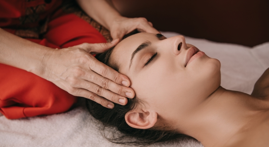 Woman receiving Thai Face Massage