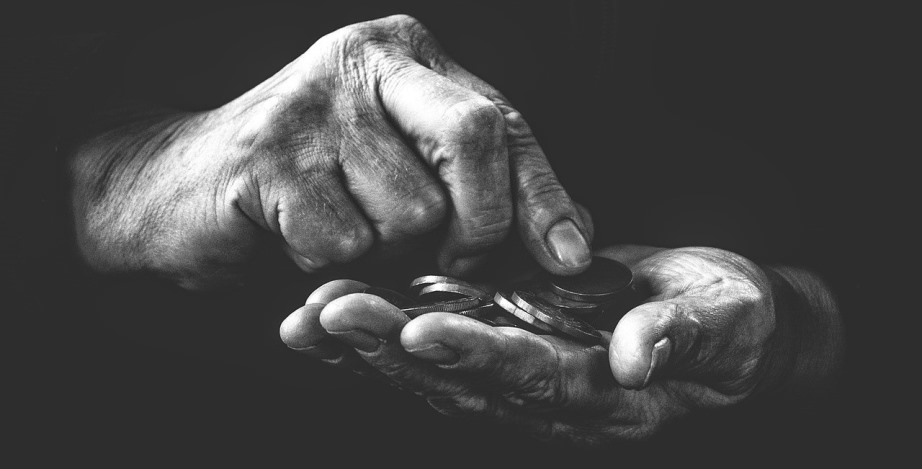 Hands counting coins