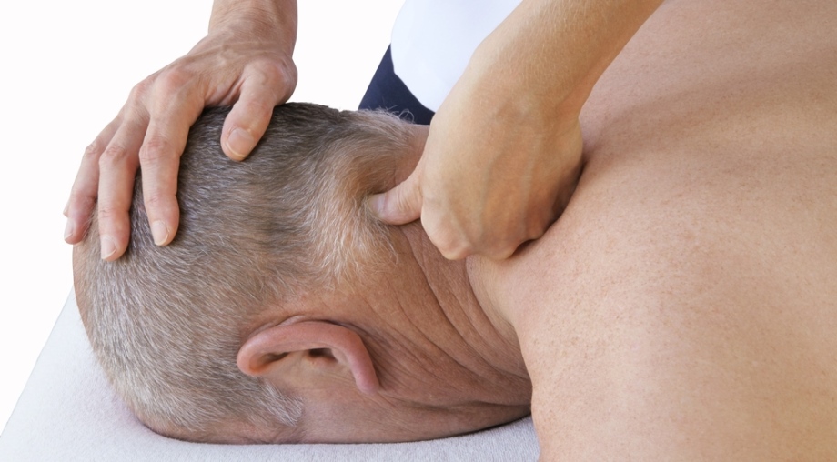 Man receiving Thai Acupressure for the neck