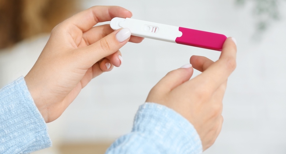 Pregnancy test in woman's hands