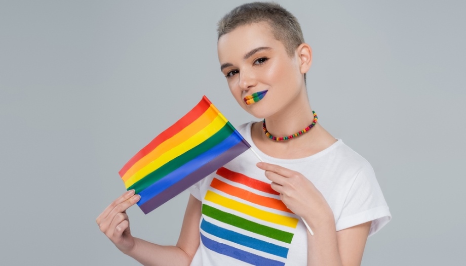 LGBT woman with support flag 