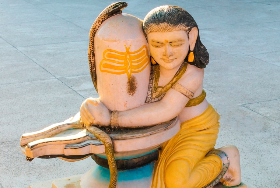 Woman embracing Lingam