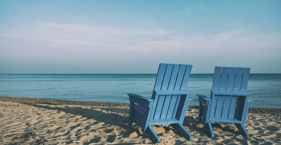 Empty chairs on the beach