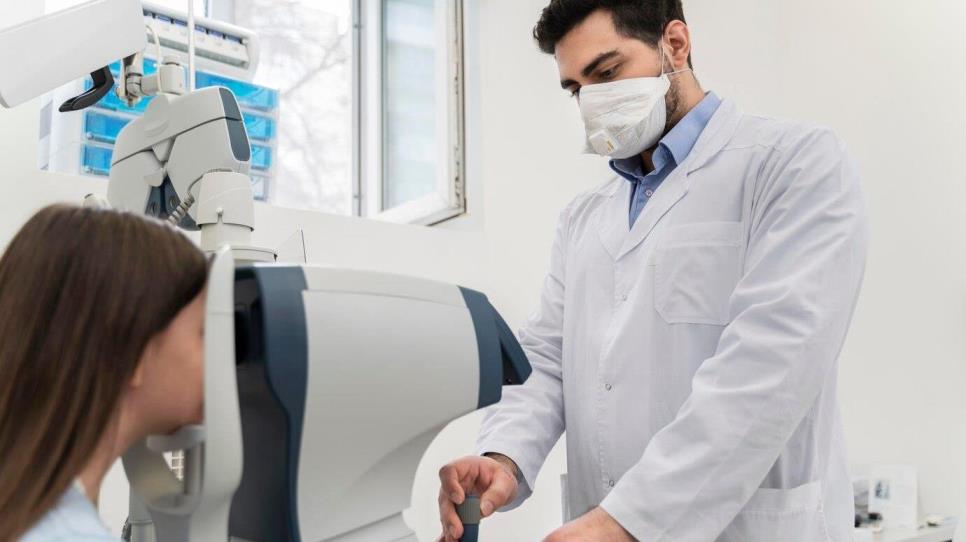 Doctor testing eyes of patient